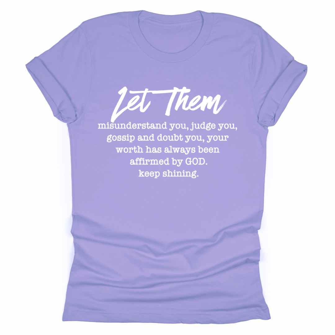 Purple t-shirt with motivational quote on a white background