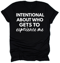 Black t-shirt with white text on a white background