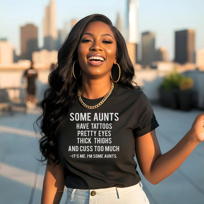 Woman wearing a black t-shirt with text in an urban setting